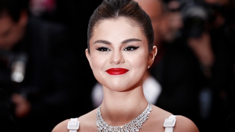 Selena Gomez half smiling