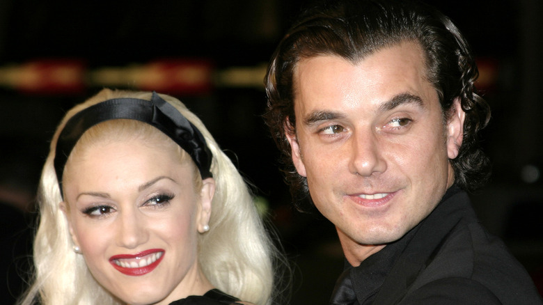 Gwen Stefani and Gavin Rossdale looking to the side