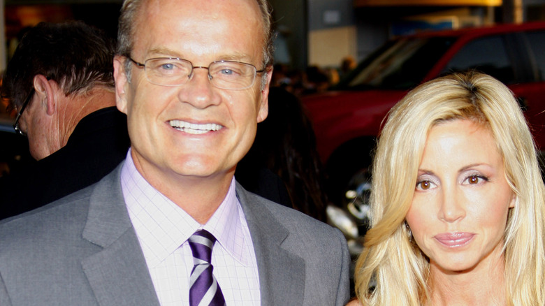 Kelsey Grammer and Camille Grammer stand next to each other