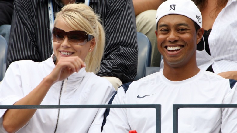 Elin Nordegren and Tiger Woods smiling