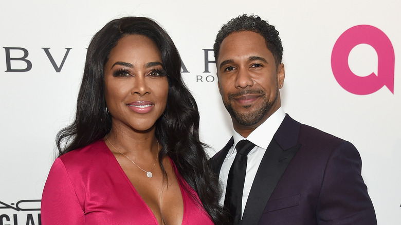 Kenya Moore, Marc Daly smiling