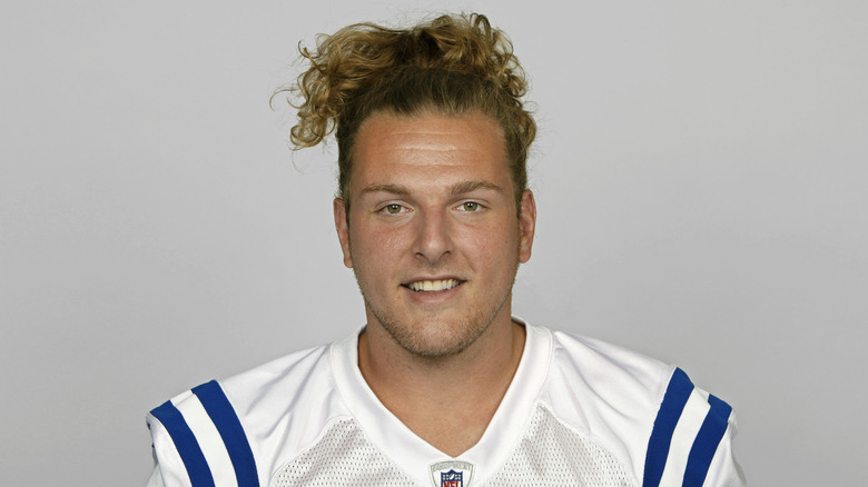 Pat McAfee posing for an Indianapolis Colts headshot