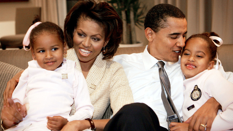 Michelle and Barack Obama with daughters 