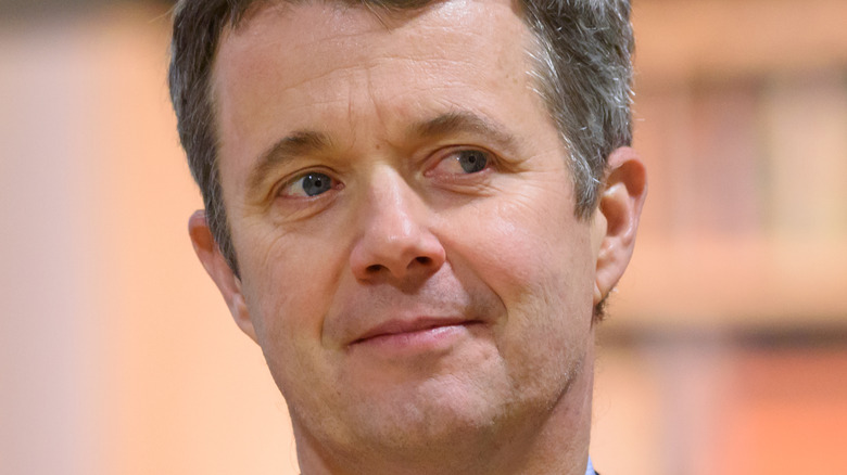 Crown Prince Frederik of Denmark looking sideways