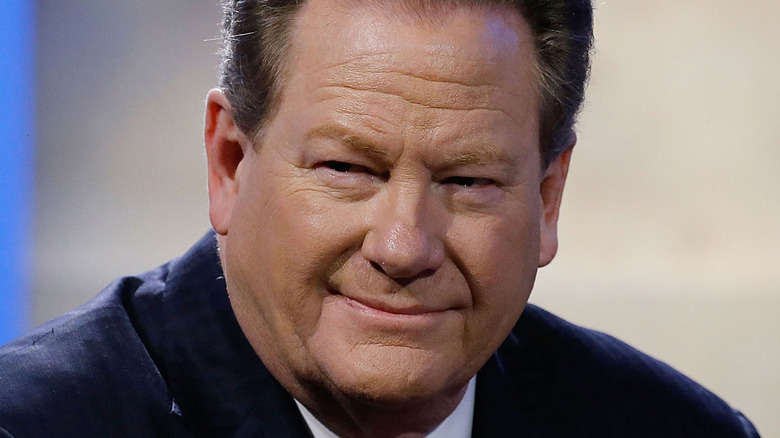 Ed Schultz grinning black suit