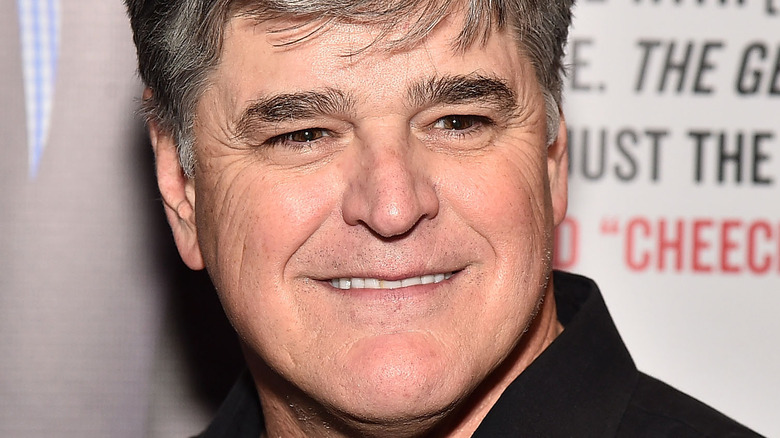 Sean Hannity smiling black shirt