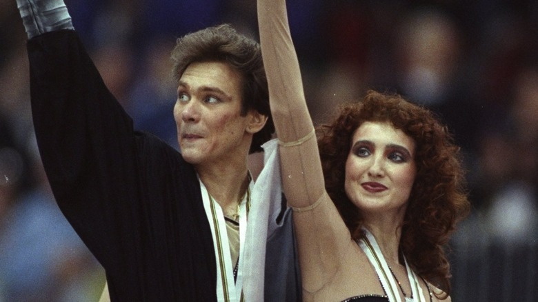 Sergei Ponomarenko and Marina Klimova waving at the crowd