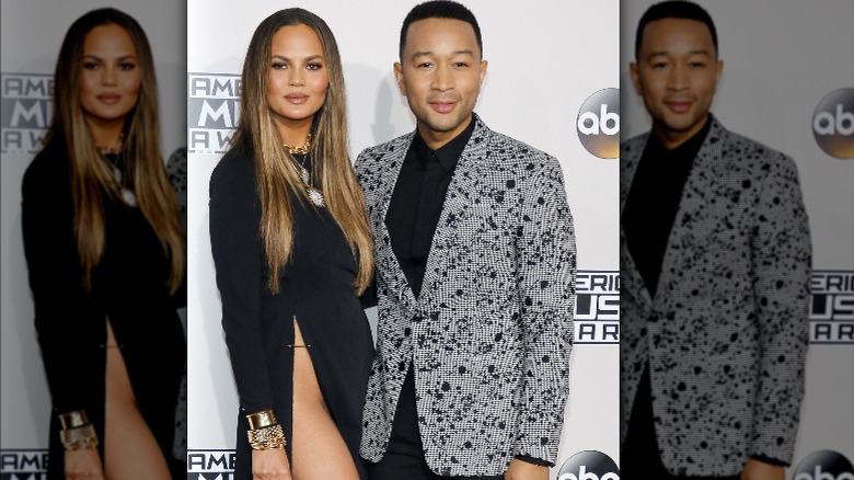 Chrissy Teigen and John Legend at an event 