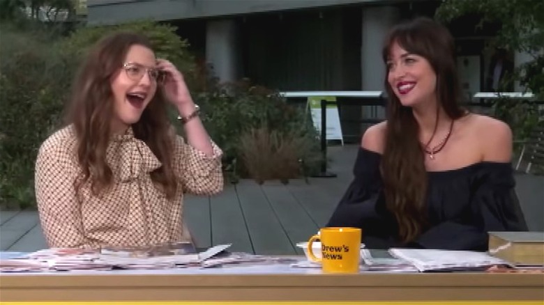 Drew Barrymore and Dakota Johnson talking