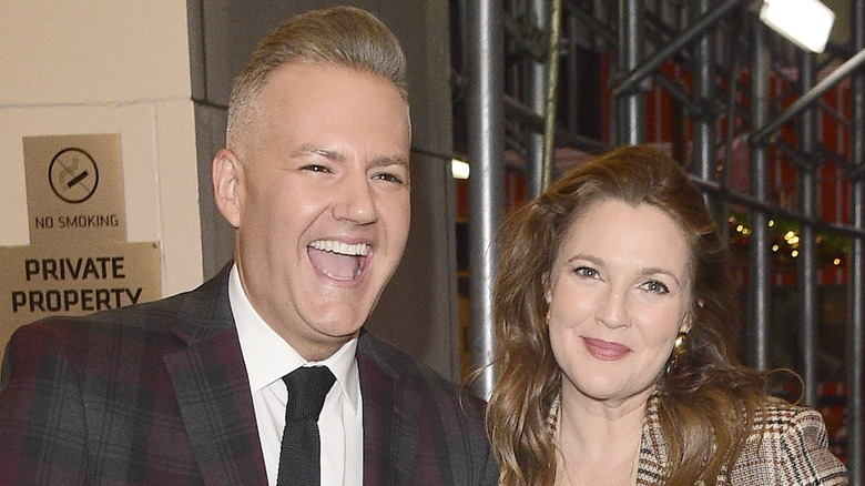 Drew Barrymore posing with Ross Mathews