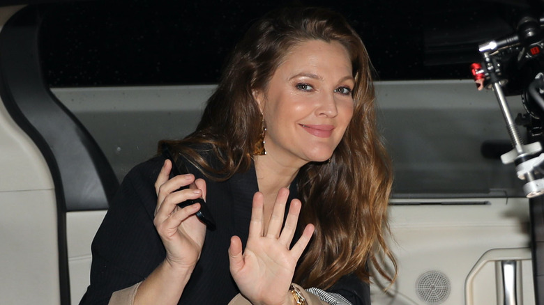 Drew Barrymore waving