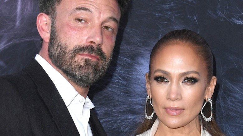 Ben Affleck side eye, Jennifer Lopez serious