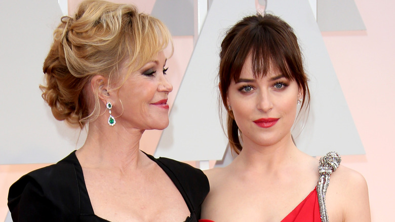 Melanie Griffith smiles at daughter Dakota Johnson