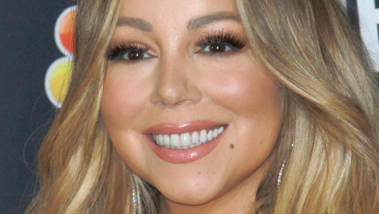 Nip Slip Again! Mariah Carey's Boobs Pop Out of Her Risque Black