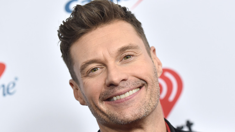 Ryan Seacrest grinning