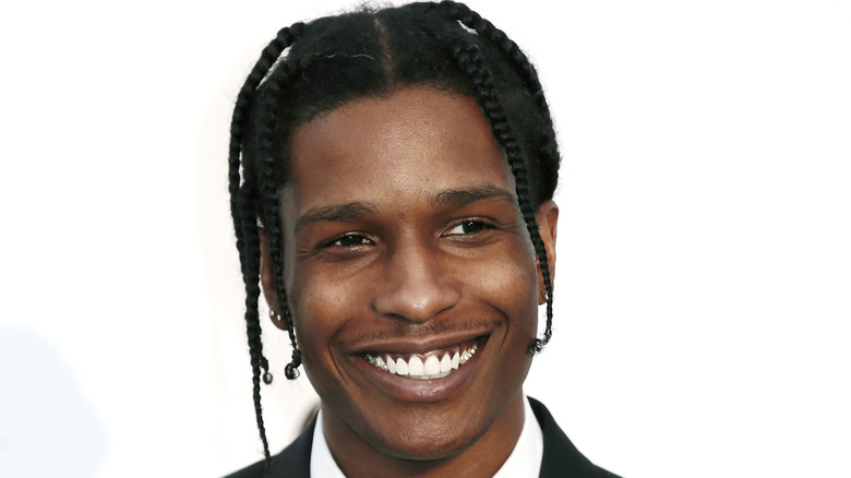 ASAP Rocky poses and smiles for a photo