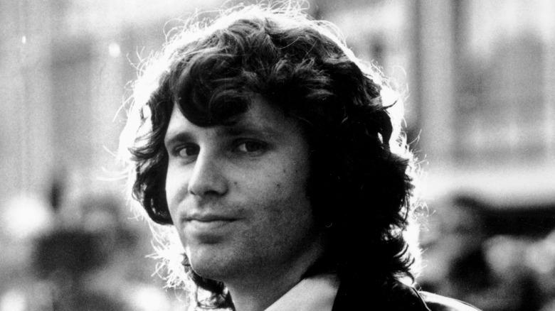 Jim Morrison posing for a photo