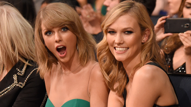 Taylor Swift and Karlie Kloss smiling