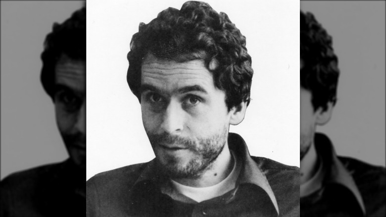 Ted Bundy in front of a blank background