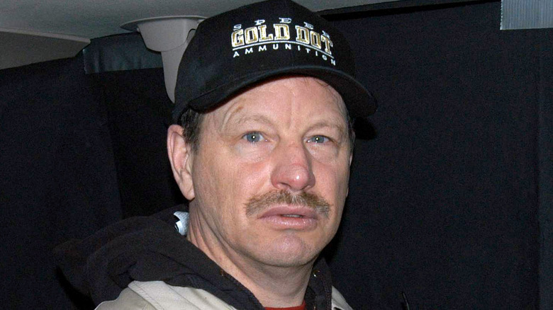 Gary Ridgway wearing a baseball hat