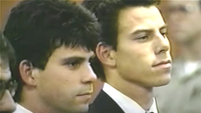 Erik and Lyle pose side by side during trial