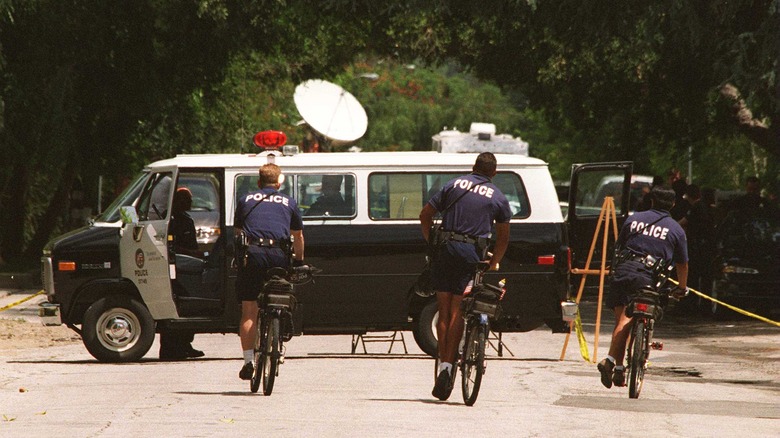 Police at the Hartman crime scene