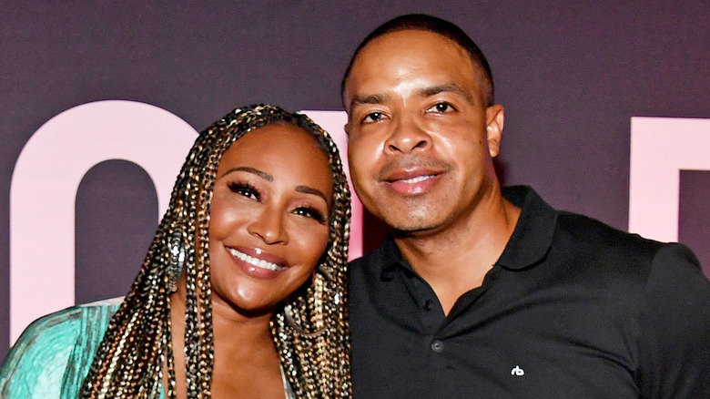 Cynthia Bailey and Mike Hill at an event