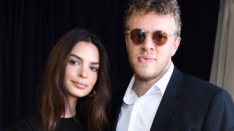 Emily Ratajkowski, Sebastian Bear-McClard posing