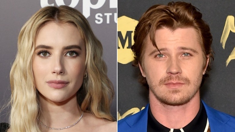 Emma Roberts, Garrett Hedlund posing