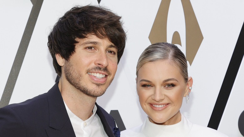 Morgan Evans and Kelsea Ballerini at an event