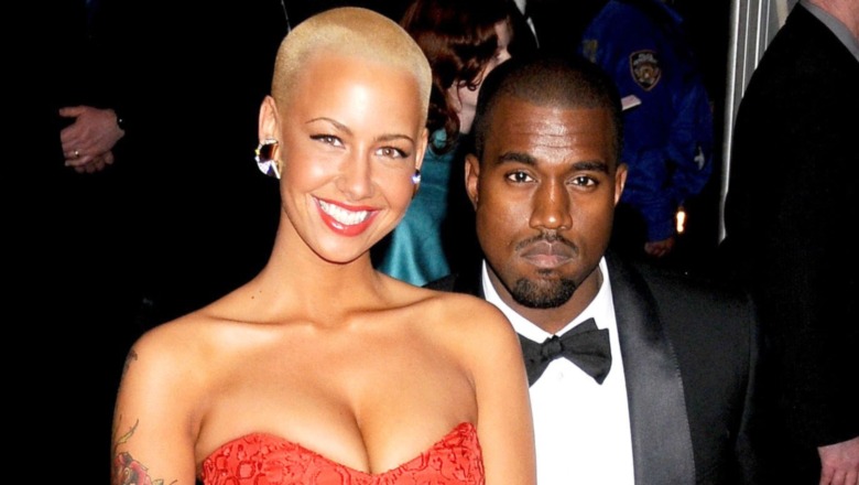 Amber Rose and Kanye West in formal wear