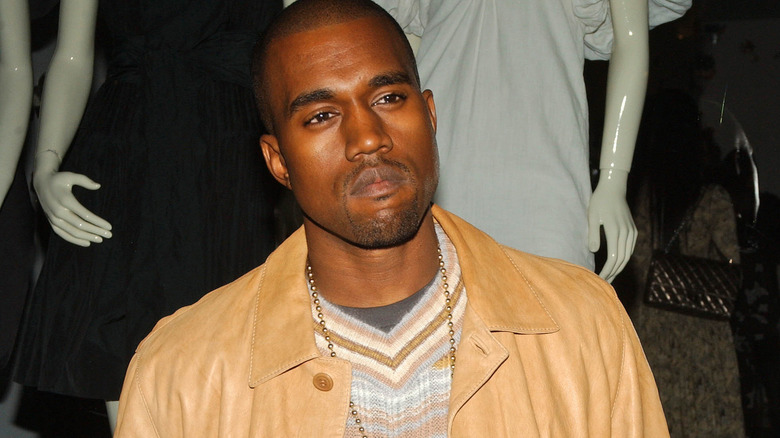 Kanye West in tan jacket