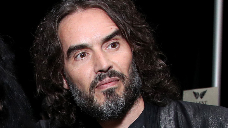 Russell Brand performing