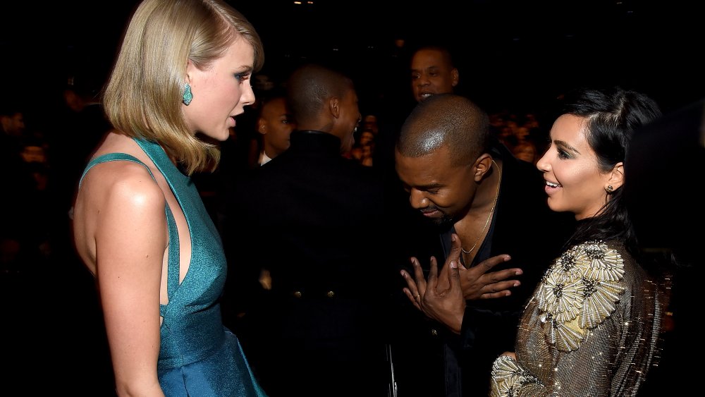 Kim Kardashian talks to Taylor Swift at the Grammys