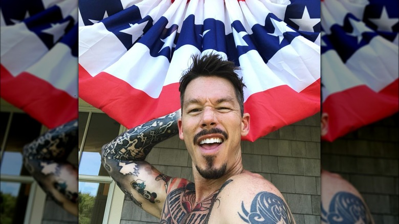 David Bromstad posing with patriotic decoration