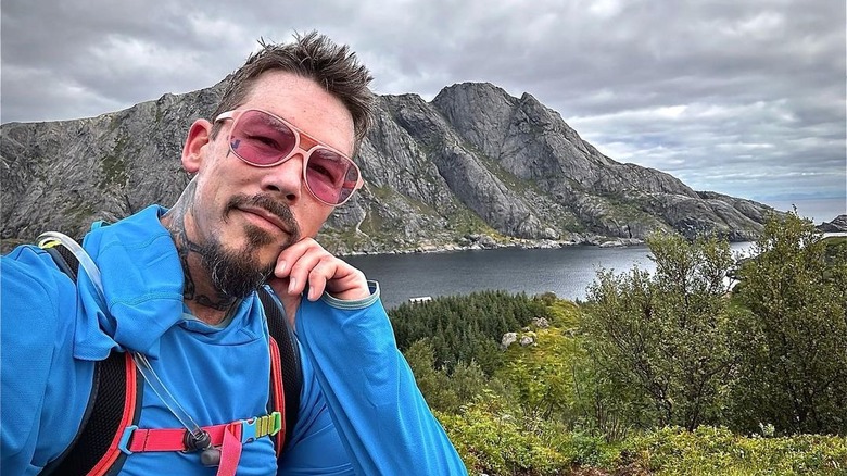 David Bromstad posing with mountain backdrop