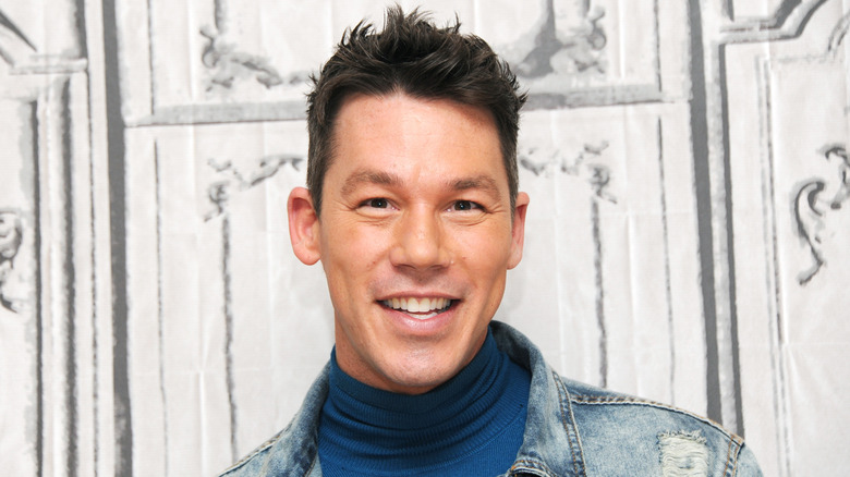 David Bromstad wearing blue turtleneck