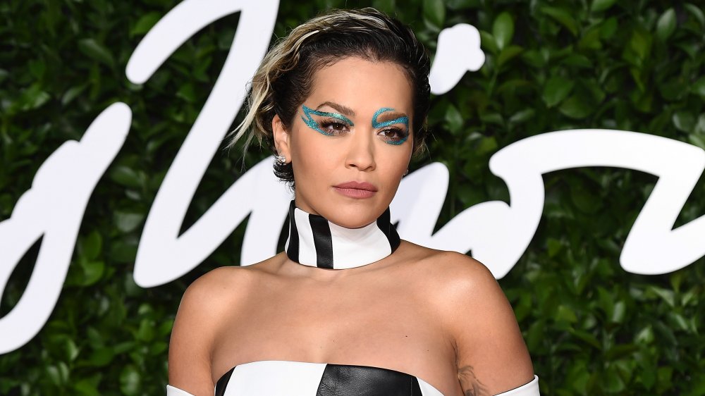 Rita Ora with turquoise exaggerated eye makeup