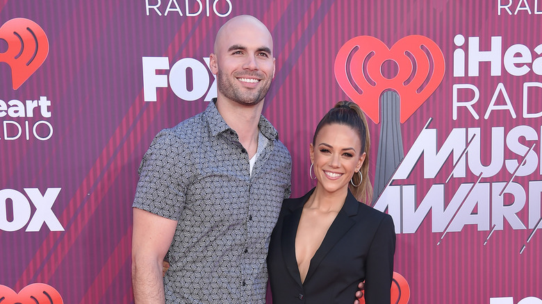 Mike Caussin and Jana Kramer on the red carpet