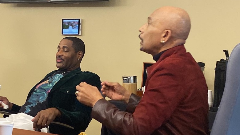 (L-R) Terrance Tykeem and Montel Williams talking