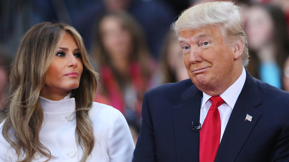 Melania and Donald Trump both seated