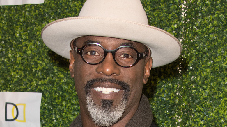 Isaiah Washington wearing a hat 