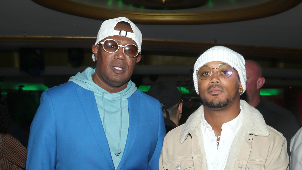 Master P posing with Lil' Romeo