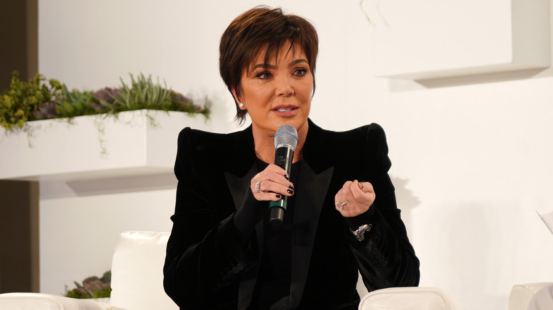 Kris Jenner holding a mic