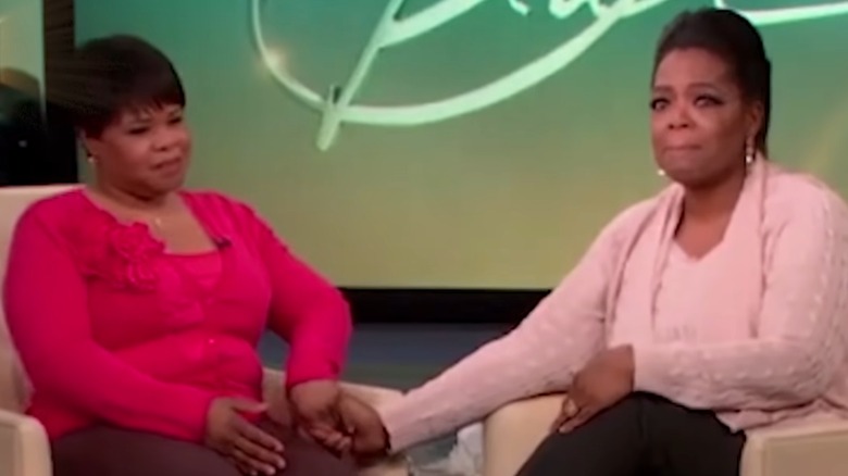 Oprah Winfrey and Patricia Lofton sitting