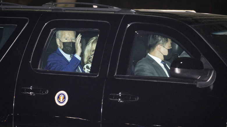 President Joe Biden and First Lady Jill Biden riding in a motorcade from the Ellipse to the White House