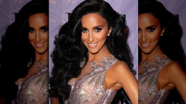 Lilly Ghalichi smiling at camera