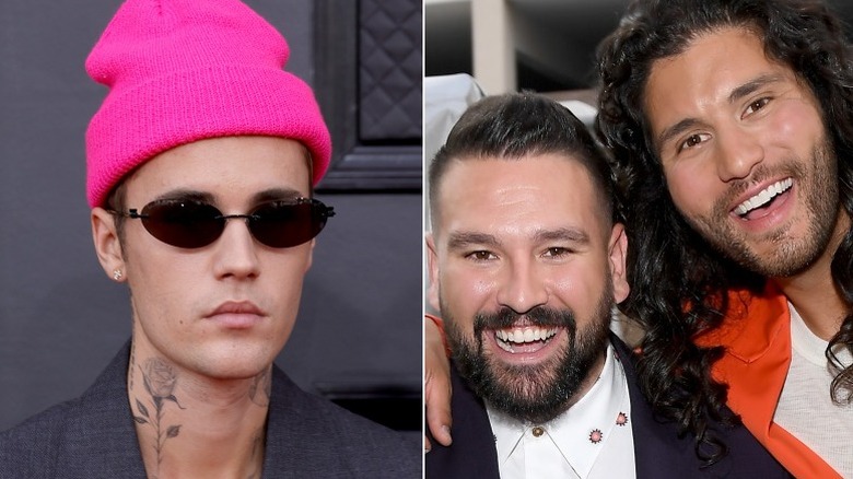 Justin Bieber in pink beanie, Dan + Shay smiling