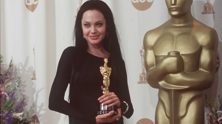 Angelina Jolie holding Oscar