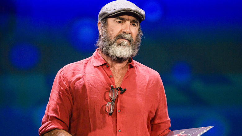 Eric Cantona accepting award